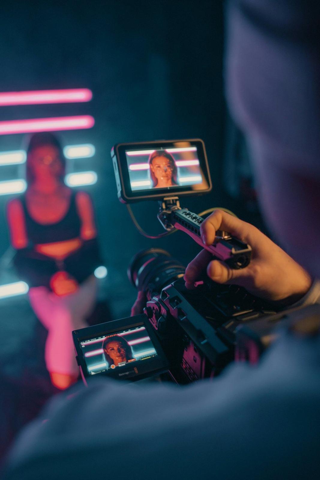 A creator films a portrait with a phone rig